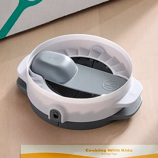 A Hand Pie & Pocket Maker on a countertop.