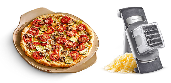 pizza on a pizza stone and parmesean with a grater