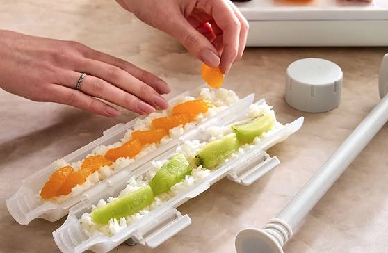 using the easy roll maker to make sushi at home
