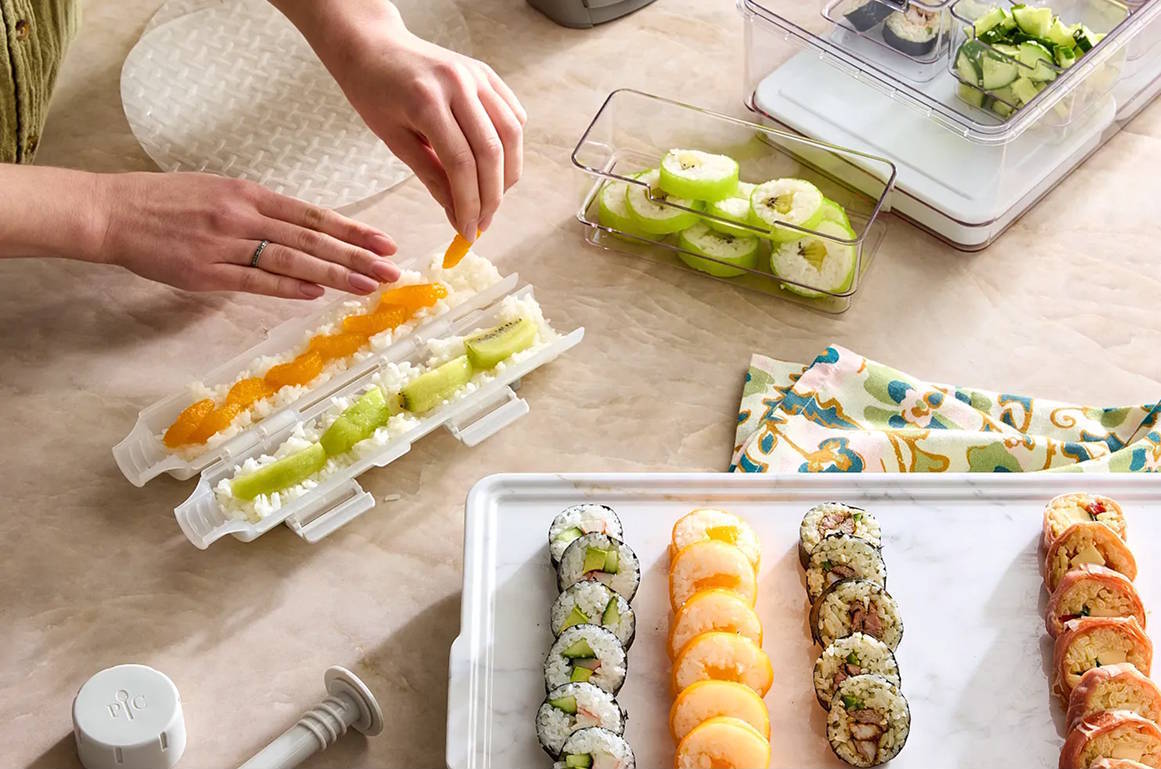 making sushi with the roll maker