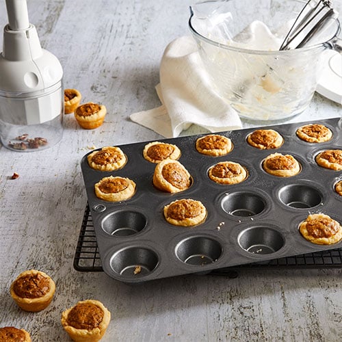 Pampered Chef - The Mini Muffin Pan will help you make 24 of your favorite  two-bite muffins, cupcakes, tarts or appetizers at a time