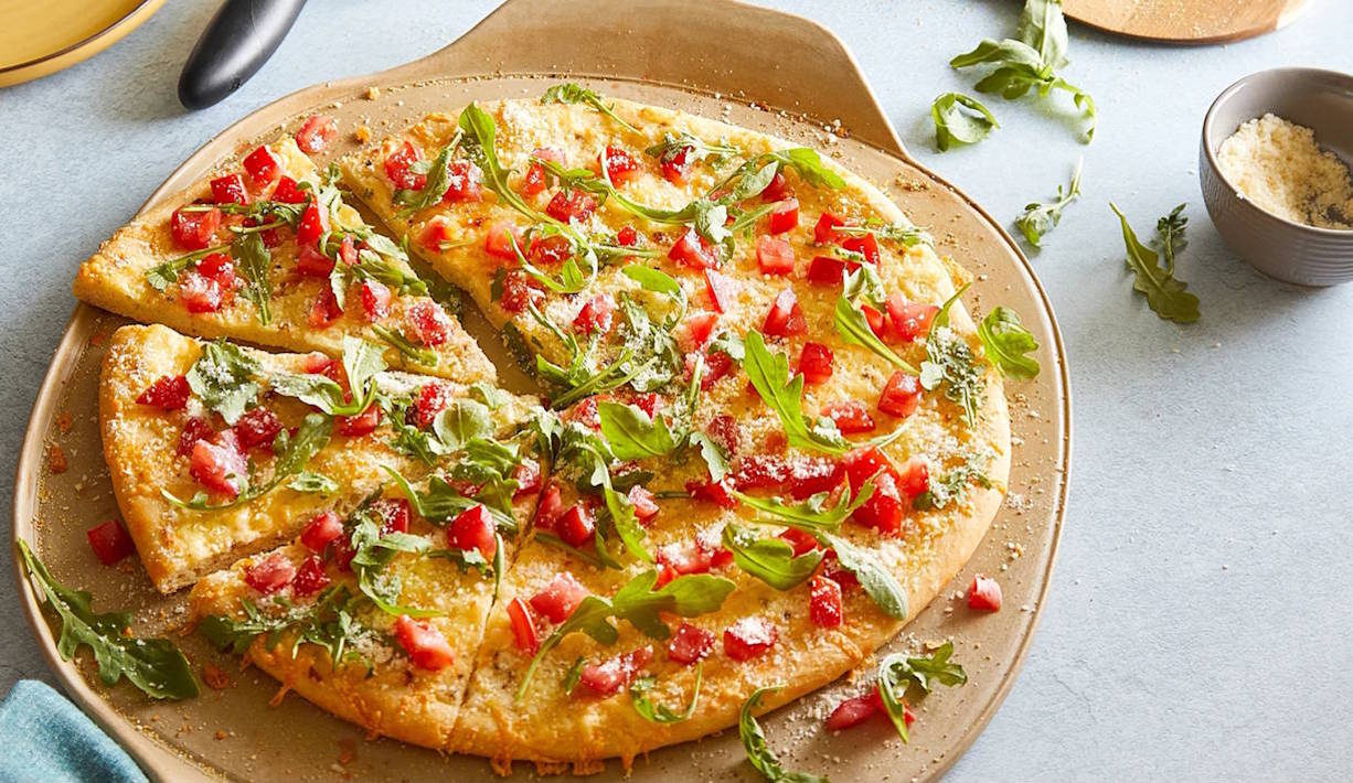Pizza on a pizza stone.